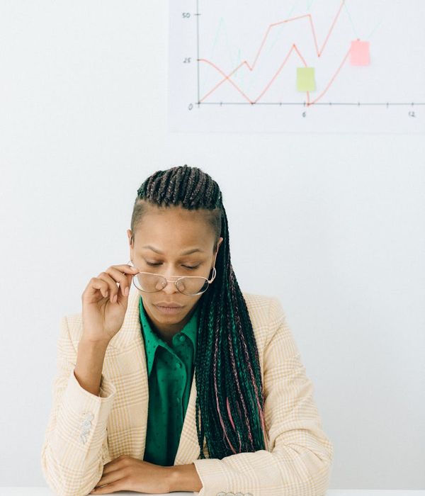 financial expert analyzing investment fund performance charts and market trends